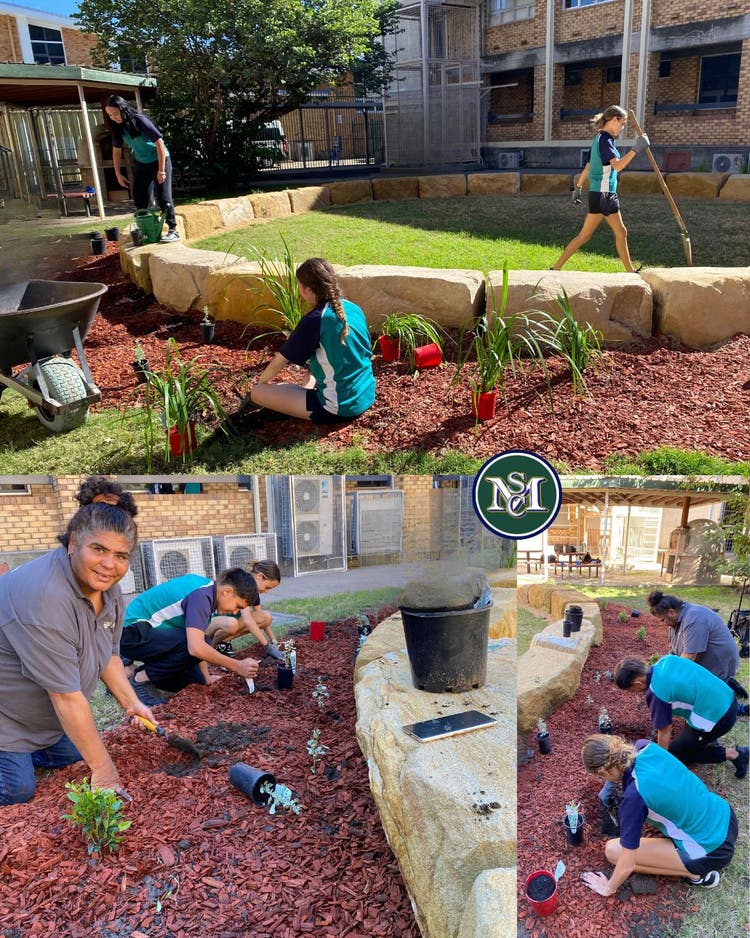 Students landscaping our yarning circle.