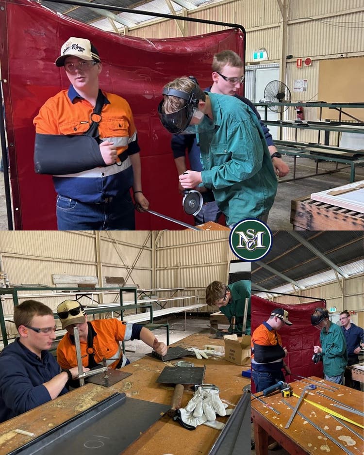 Students using tools in a workshop